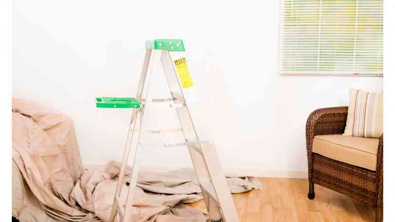 how to  protect laminate floor from spills using canvas drop cloth 